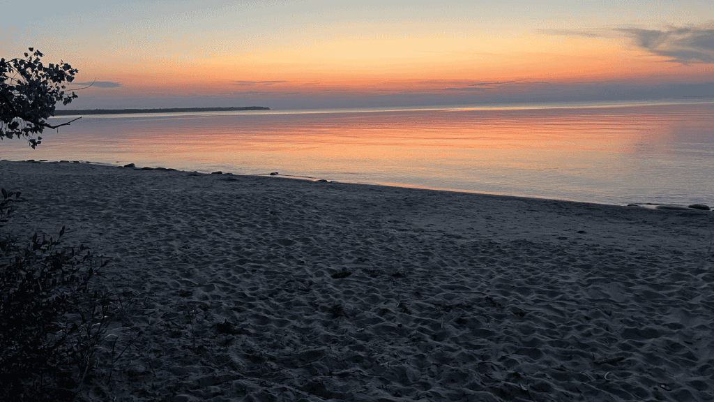 sunset over Lake Huron in Port Crescent State Park