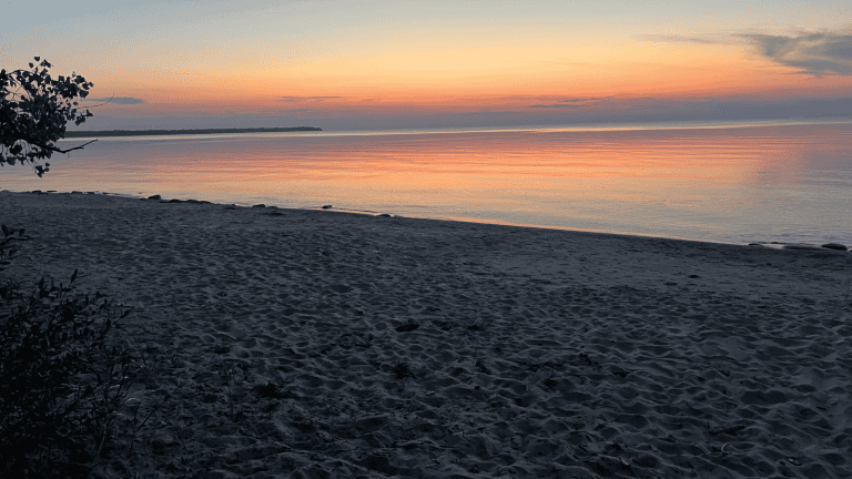 sunset over Lake Huron in Port Crescent State Park