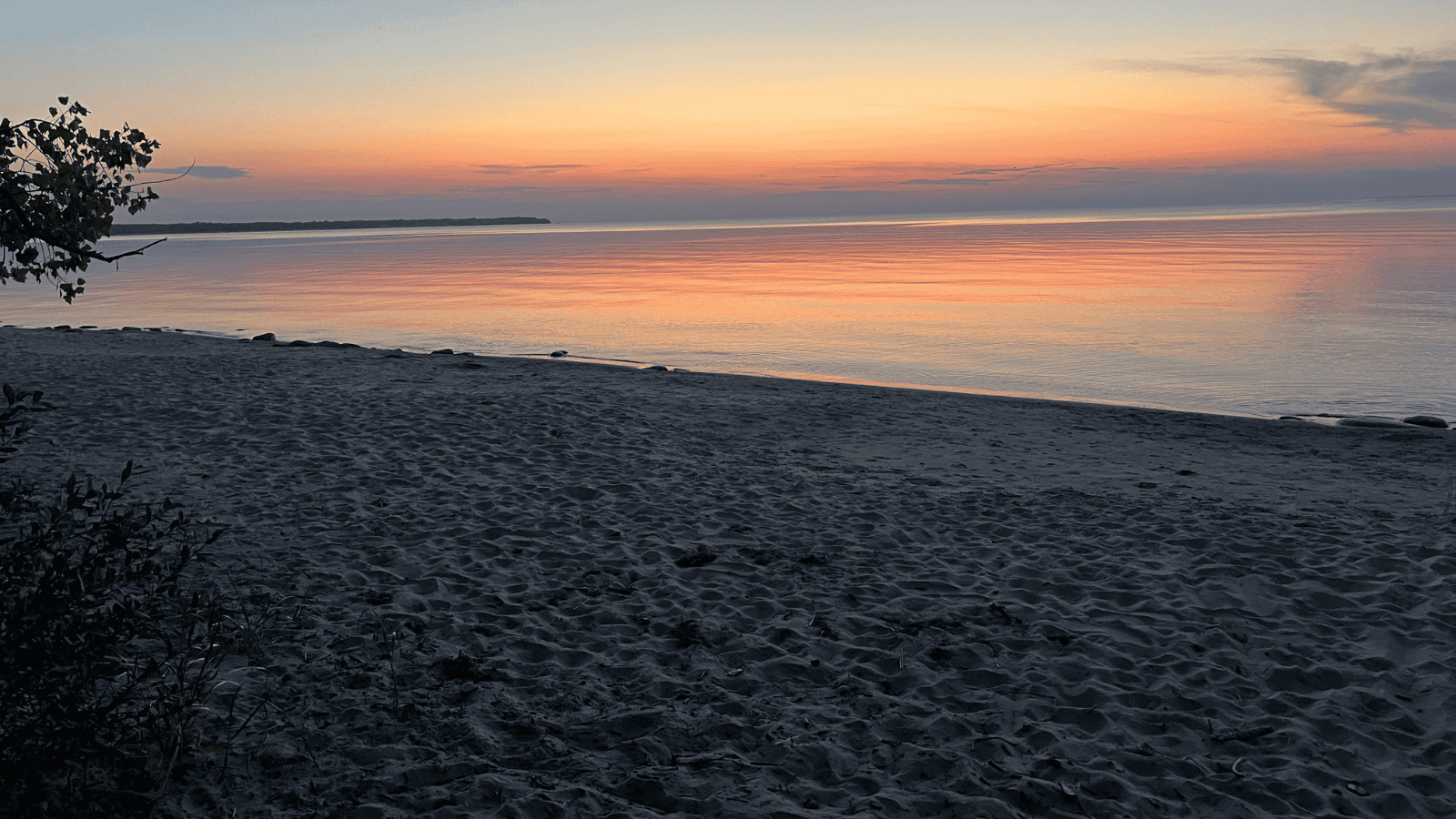 sunset over Lake Huron in Port Crescent State Park